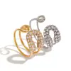 Jingqiao Sentido de Diseño Transfronterizo Anillo de Acero Inoxidable Oro 18K Circonita Clip de Papel Anillo Abierto Lujo Ligero Joyería de Gama Alta