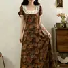 Vestido floral retro estilo francés, nueva colección de verano 2026, escote cuadrado, cintura ajustada, elegante, vestido maxi línea A para vacaciones