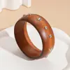 Pulsera Geométrica Redonda de Madera China Retro con Remaches de Estrella Joyería de Mano Elegante de Gama Alta Simple de Nicho de Moda para Mujeres