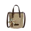 Bolsa Pequeña Tejida de Verano Yuezi para Mujer 2026 Nuevo Estilo Coreano Casual Simple Bolsa para Teléfono Móvil Bolso Cubo de Moda Versátil
