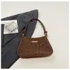Nova Bolsa Vintage em Relevo Baguete de Ombro para Mulheres 2026, Bolsa de Ombro com Alça de Nó Simples, Bolsa de Nicho Estilo Coreano para o Dia a Dia