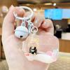 Nova pulseira de pingente de areia movediça criativa urso sentado chaveiro de óleo flutuante garrafa flutuante fofa pingente pequeno para meninas