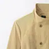 Comercio exterior transfronterizo al por mayor ropa de mujer 2026 otoño nuevo moda estilo europeo y americano color liso con decoración de bolsillo gabardina de cuello alto