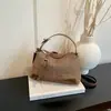 Bolso de mano tejido simple transfronterizo para mujer, nuevo estilo verano 2026, bolso de hombro y bandolera de moda para el día a día con bloqueo de color
