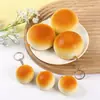 Pu Rebote Lento Comida Simulada Modelo de Pan al Vapor Dorado Colgante de Pan al Vapor Horneado Juguete Squishy para Alivio del Estrés de Comida Simulada