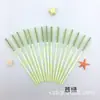 Los fabricantes suministran un nuevo cepillo de pestañas de nailon Rod de dos colores desechable, peine de pestañas de color, pincel de maquillaje