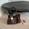 Bolso tote minimalista de nicho Shuai Mi Jia para mujer, nuevo modelo otoño 2026, de gran capacidad, casual, para ir al trabajo, de hombro y debajo del brazo