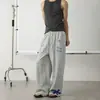 Calça de moletom estilo americano com patches estampados de letras de bolso, unissex, estilo minimalista, nicho, caimento relaxado, calça casual de perna reta