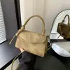 Coleção Outono 2026: Bolsa estilosa e elegante de ombro único, com uma cor sólida chique, design retrô e textura minimalista, perfeita como bolsa de mão ou bolsa transversal.