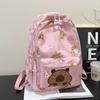 Mochila de Grande Capacidade 2026 Novo Estilo Fashionável e Estilosa Bolsa Escolar para Alunos do Ensino Médio Mochila Casual Infantil e Fofa para Homens e Mulheres