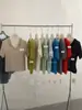 Camisa de Tricô Minimalista de Verão Relaxada e Emagrecedora de Caimento Solto com Gola Polo de Manga Curta para Mulheres