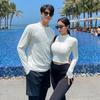 Roupa de banho de casal Dongdaemun Coreia do Sul transfronteiriça zíper frontal parcial preto e branco conservador modeladora cobre a barriga calça de manga longa roupa de mergulho