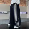 Calça Masculina Estilo Primavera e Outono 2026 Novo Estilo Crianças Maiores Outono Meninos Perna Larga Esportiva Roupas de Outono Infantis Estilo Cool Rogue Calça Longa