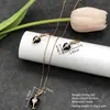 Conjunto de pendientes y collar Xuping estilo vintage de nicho europeo y americano transfronterizo, conjunto de joyería elegante de aleación de cobre, venta al por mayor y hecho a medida