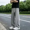 Pantalones deportivos casuales de seda helada texturizada para hombre, pantalones de verano sueltos rectos transpirables para hombre, pantalones largos fluidos para jóvenes