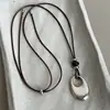 Cuchara pequeña color café con forma de pez, óvalo irregular, collar extraíble de piedra ojo de tigre, accesorio de moda para mujer estilo Melard