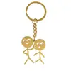 Llavero con colgante de pareja de grafiti de acero inoxidable exclusivo transfronterizo, figura pequeña, llavero de hombre palo grande