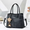 2026 Bolso Nuevo para Mujer Estilo Coreano Bolso Tote Sencillo con Colgante de Flor, de Mano, de Hombro, Cruzado, Versátil para Todas las Estaciones