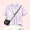 Conjunto escolar de dos piezas para niños medianos y mayores: Chal a rayas de bloques de color, top de manga corta y linda falda de pastel para niñas