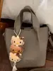 Bolsos Retro de Nicho para Mujer 2026 Nueva Moda Bolso de Mano de Alto Valor para el Trabajo Bolso Cruzado tipo Cubo