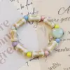 Jingdezhen Pulsera de Cerámica Suministro Fresco Pequeño Dibujos Animados Adornos de Mano Lindos Verano Puesto de Viaje Transmisión en Vivo Fabricante Mayorista