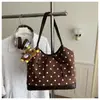 Bolso de hombro de moda coreana para mujer, nuevo, con lunares, para el trabajo, comercio exterior 2026, gamuza