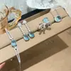 Conjunto de quatro peças elegante de anel, colar, brincos e pulseira com zircônia, requintado e versátil, estilo borboleta coreano, design requintado de Dongdaemun