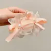 Accesorio de pinza para el pelo floral de Zhao Lusi para mujer, perfecto para vacaciones en la playa y sesiones de fotos, creando un look atmosférico