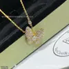 Versión Alta Trébol de Cuatro Hojas Estilo Nuevo Rima Púrpura Fragancia Flor de Ciruelo Mariposa Azul Collar Mismo Estilo que Celebridad de Internet Sensación de Alta Gama Pulsera de Mariposa de Cinco Pétalos