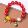 Pulsera de Raíz de Bodhi de Jade Rojo Especificaciones 1.2 con Colgante de Campana de Oro Arena Pulsera de Rosario para Hombres y Mujeres Venta al por Mayor