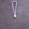 Venta al por mayor de fábrica cordón para teléfono móvil de cuero PU cuero llavero para cámara cordón para pareja correa de muñeca para teléfono móvil cuerda trenzada de cuero