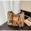 Bolso Grande de Mezclilla Transfronterizo para Mujer, Versátil Otoño e Invierno 2026 Nuevo Bolso de Hombro Casual, Bolso Tote Texturizado para el Trabajo