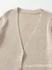 Comercio exterior transfronterizo ropa de mujer, nueva colección de otoño, estilo europeo y americano, diseño de moda, chaqueta cárdigan de punto con cuello en V 38959002
