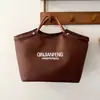 Bolso de Gran Capacidad Estilo Coreano Diseño de Nicho Bolso Moda Nueva Primavera 2026 Bolso de Tela Simple Ligero para Mujeres