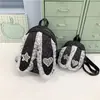 Mochila de encaje de lunares dulce y femenina con diseño de nicho estilo coreano y conejo de orejas grandes, mochila pequeña moderna y elegante para viajar
