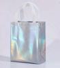 Bolso de mano no tejido con película de color láser, bolsa de embalaje de marca de moda, bolsa de regalo para compras en zapaterías de mujer, logotipo imprimible