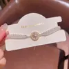 Pulseira dupla camada com zircônia e pérolas artificiais, design de estrela redonda, joia elegante vintage de nicho de alta qualidade e estilosa