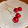 Pendientes de cereza acrílica roja dulce, pendientes de frutas de primavera y verano distintivos de Corea del Sur, pendientes de temperamento de nicho de alta calidad.