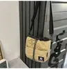 Bolso Cubo con Cordón de Patrón de Diamante para Hombres y Mujeres 2025 Nuevo Bolso de Hombro Ligero para Commuting Bolso Cruzado Versátil para Teléfono Móvil