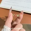 Anillo de Mariposa Retro Diseño de Nicho de Gama Alta Elegante Moderno Versátil Exquisito Lujo Accesible Anillo de Cuerda de Mariposa