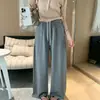 O estilo coreano é super bonito! Novo modelo outono 2026: calça casual versátil com cintura elástica e pernas largas na cor âmbar-cobre