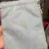 Bolso de piel sintética ligeramente defectuoso, bolsa de almacenamiento de doble capa 16*20, USD 0.7 cada una, forro intacto