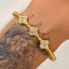 Venda Quente Transfronteiriça Impermeável Resistente ao Desbotamento Aço Titânio Conjunto de Pulseiras de Flor Levemente Luxuoso High-End Moda Versátil Banhado a Ouro 18K