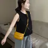 Top Chaleco sin Mangas con Volantes en el Dobladillo de Encaje Estilo Francés 2026 Verano Nuevo Elegante Nicho Color Sólido Top para Mujer