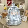 Mochila escolar artística de cuadros estilo coreano con un ambiente relajante, con cachorros de dibujos animados, adecuada para chicas dulces y mejores amigas, ideal para salidas