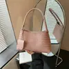 Bolso cruzado francés simple tejido tipo Baguette para mujer 2026 Verano Nuevo estilo Temperamento Bolso para madre e hijo Viaje diario Bolso de axila