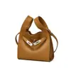 Bolso de mano de cuero genuino de moda coreano de nicho, modelo popular nuevo de comercio exterior transfronterizo 2026, bolso bandolera simple de mano