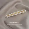 Horquilla de perla con pequeño clip para el pelo, tocado, pinza para el pelo para mujer, popular en línea, nuevo clip lateral, accesorios para el cabello fino de alta gama, venta al por mayor