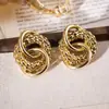 Pendientes de Aro Geométricos Entrelazados de Aguja Plateada Moda Transfronteriza Europea y Americana Pendientes de Venta Caliente Elegantes Simples Versátiles de Nicho