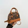 Bolsa de concha elegante de inverno 2024, nova, casual, com alça transversal, costura, estampa de leopardo, moderna, têxtil, feminina